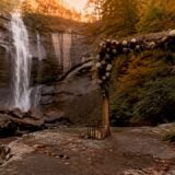Toccoa Falls with wedding arch at sunrise