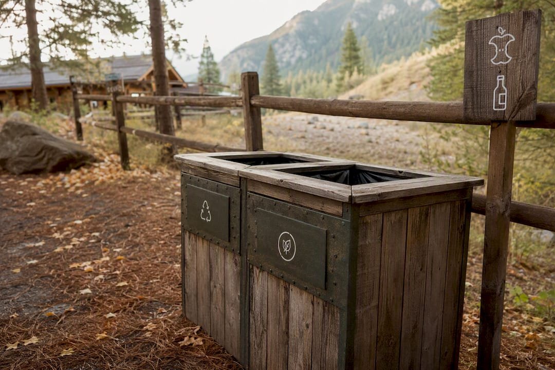 Compost and recycling bins at mountain wedding
