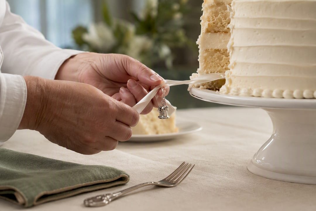 Silver charm pulled from wedding cake